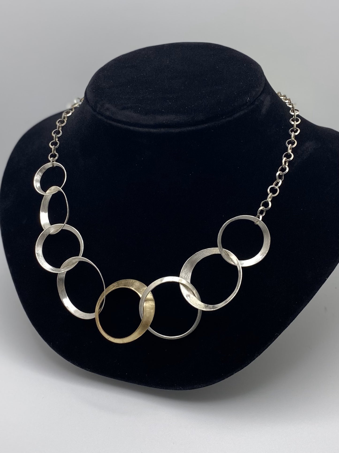 Eight Circles Handmade Necklace in Round Sterling Silver & Brass